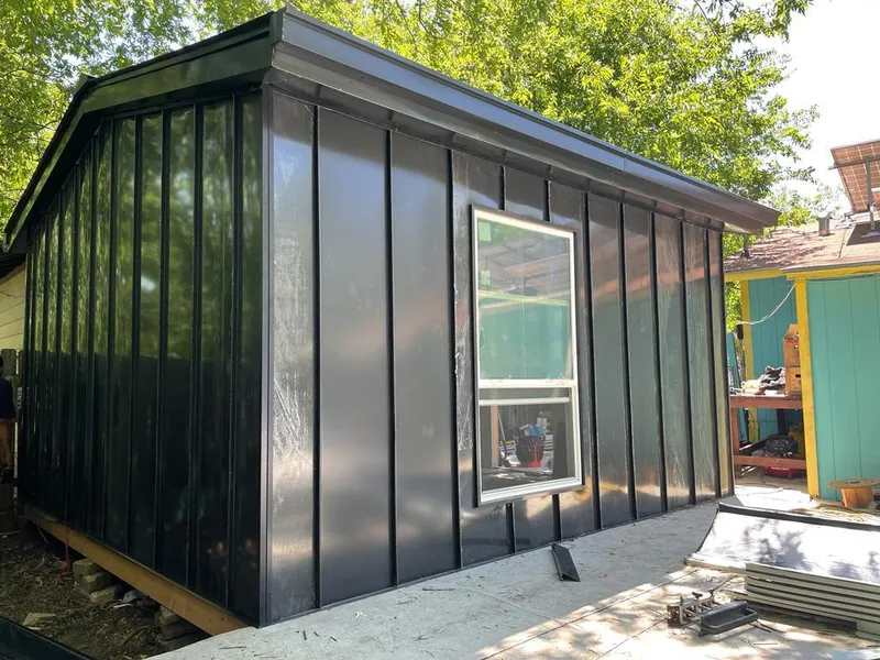 Black standing seam metal wall panels for Metal Roof Installation in Battle Ground